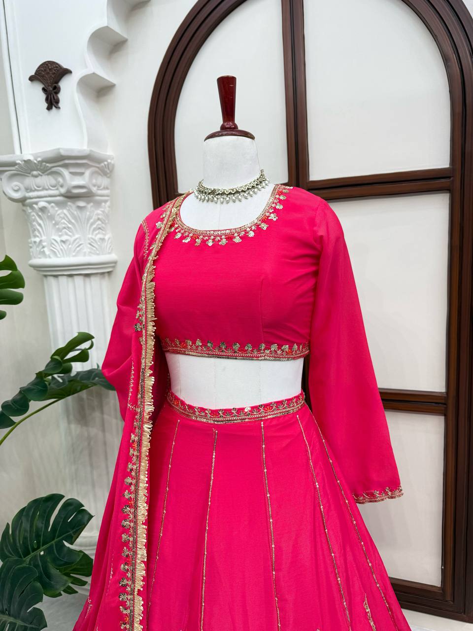 Radiant Rani Pink Silk Lehenga Choli Adorned with Opulent Heritage Floral Motifs and Intricate Zari Borders